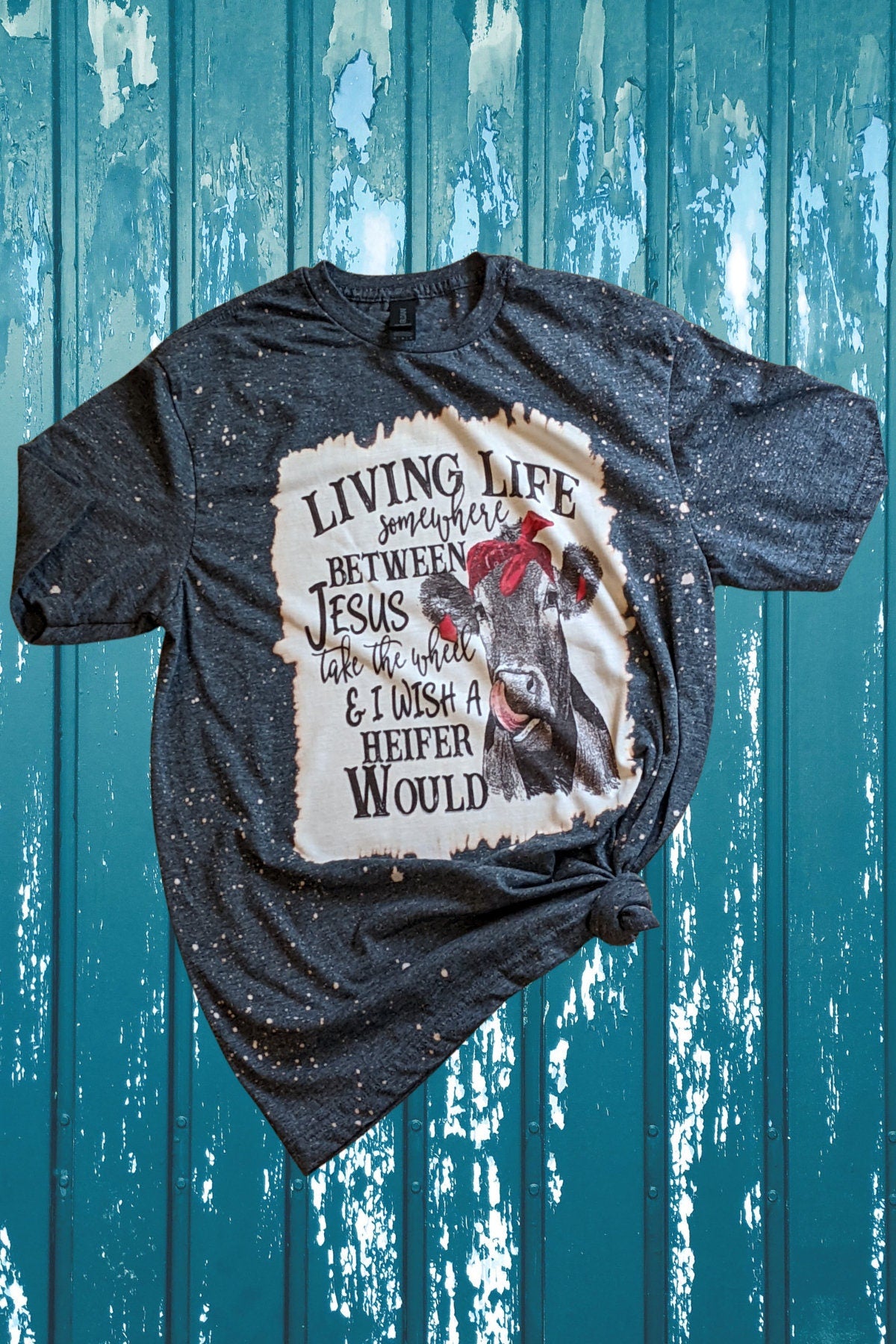 Living life somewhere between Jesus take the wheel and I wish a heifer would tee, Bleached t shirt, Woman T shirt,  Birthday gift