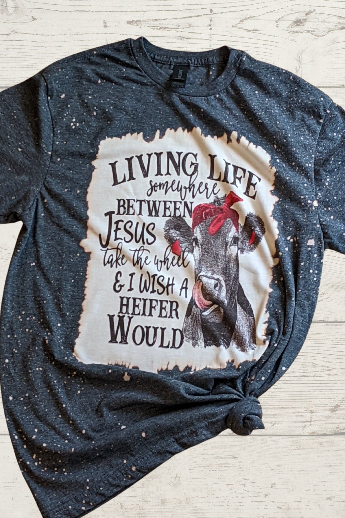 Living life somewhere between Jesus take the wheel and I wish a heifer would tee, Bleached t shirt, Woman T shirt,  Birthday gift
